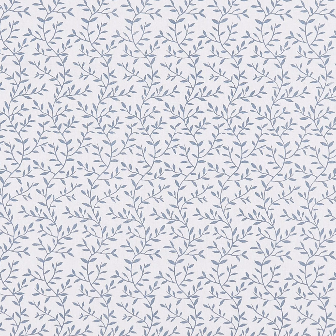 Ivory fabric with closely spaced blue-grey leafy branches in a fine botanical pattern