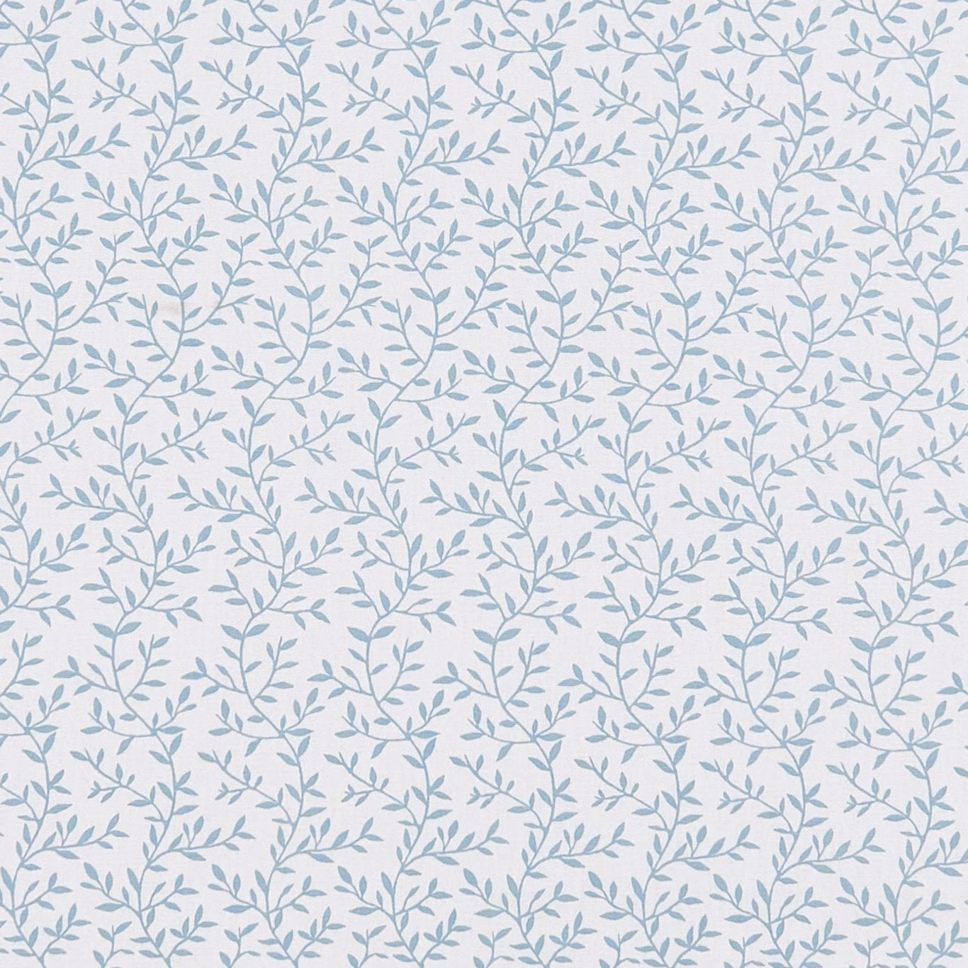 Pale ivory fabric with delicate mineral-blue leafy branches in a small repeat