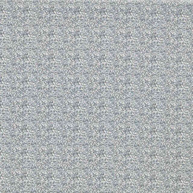 Muted denim blue-grey fabric with a tiny scrolling floral pattern and softly mottled texture