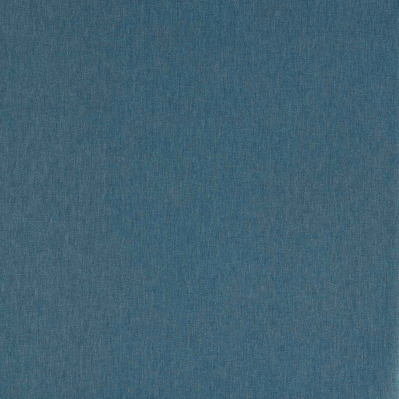 Close-up of muted denim-blue fabric with a fine, softly varied woven texture