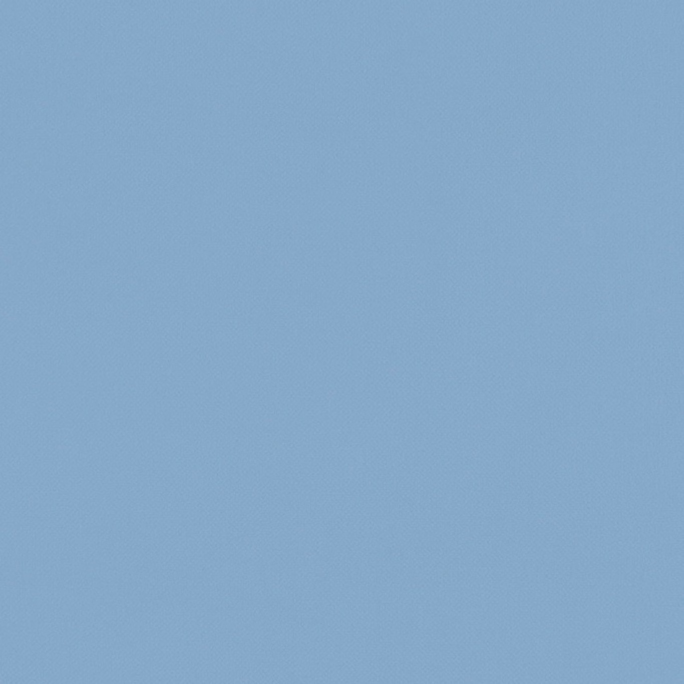 Muted chambray-blue plain weave with subtle tonal flecks and soft texture