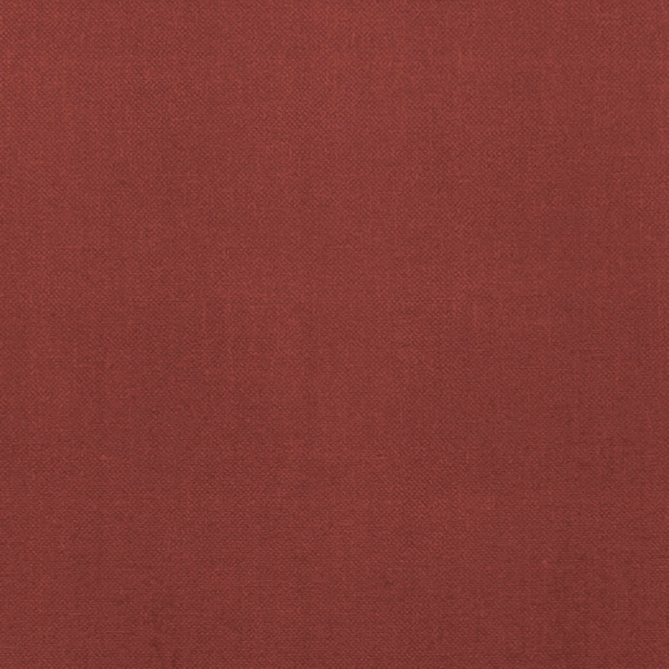Deep ruby-red fabric showing a fine, subtly mottled plain weave texture