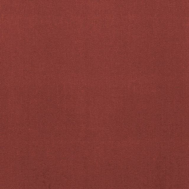 Deep ruby-red fabric showing a fine, subtly mottled plain weave texture
