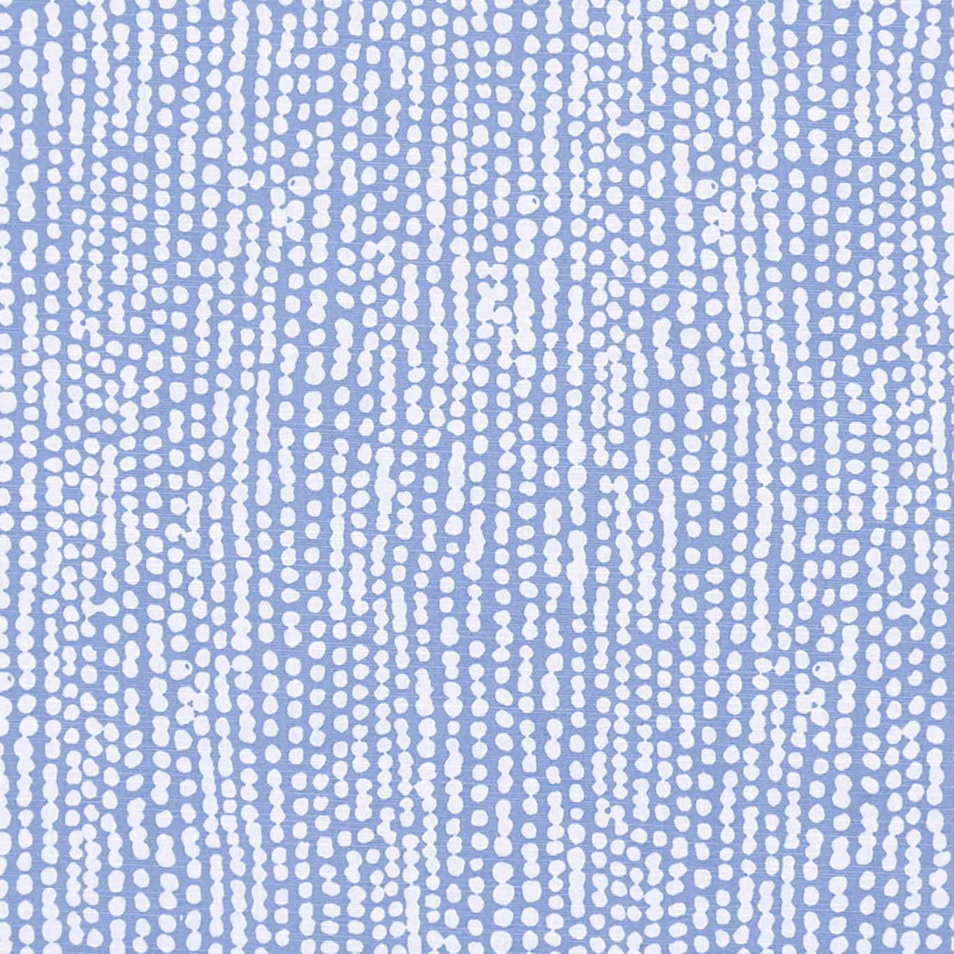 Pale chambray-blue fabric with dense broken white vertical dotted trails