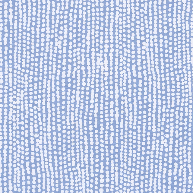 Pale chambray-blue fabric with dense broken white vertical dotted trails