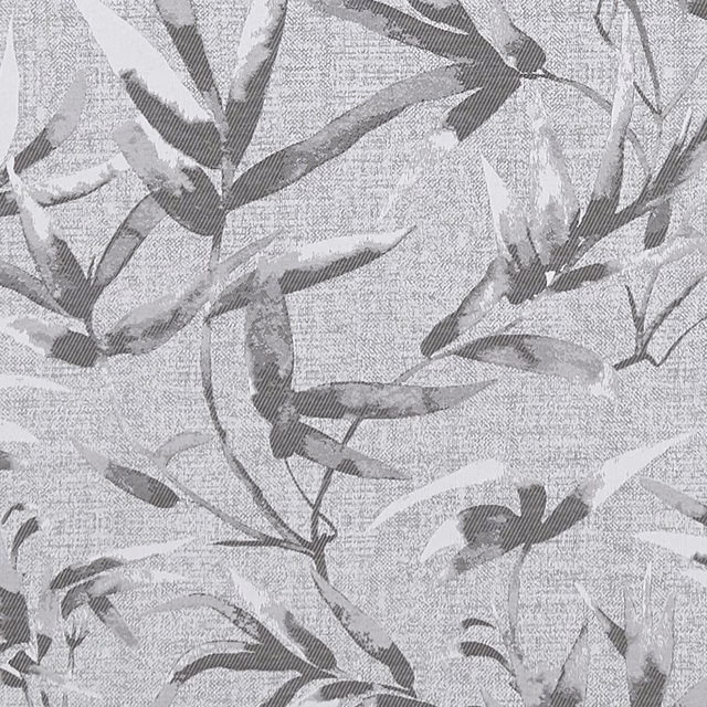 Cool charcoal-grey woven ground with pale leaves and branching botanical stems