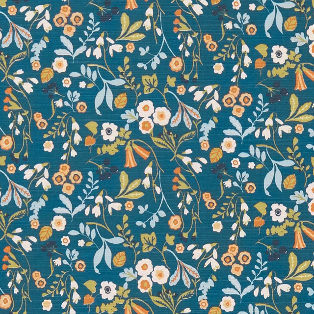 Denim-teal woven floral with cream blossoms, pale blue leaves and spice accents
