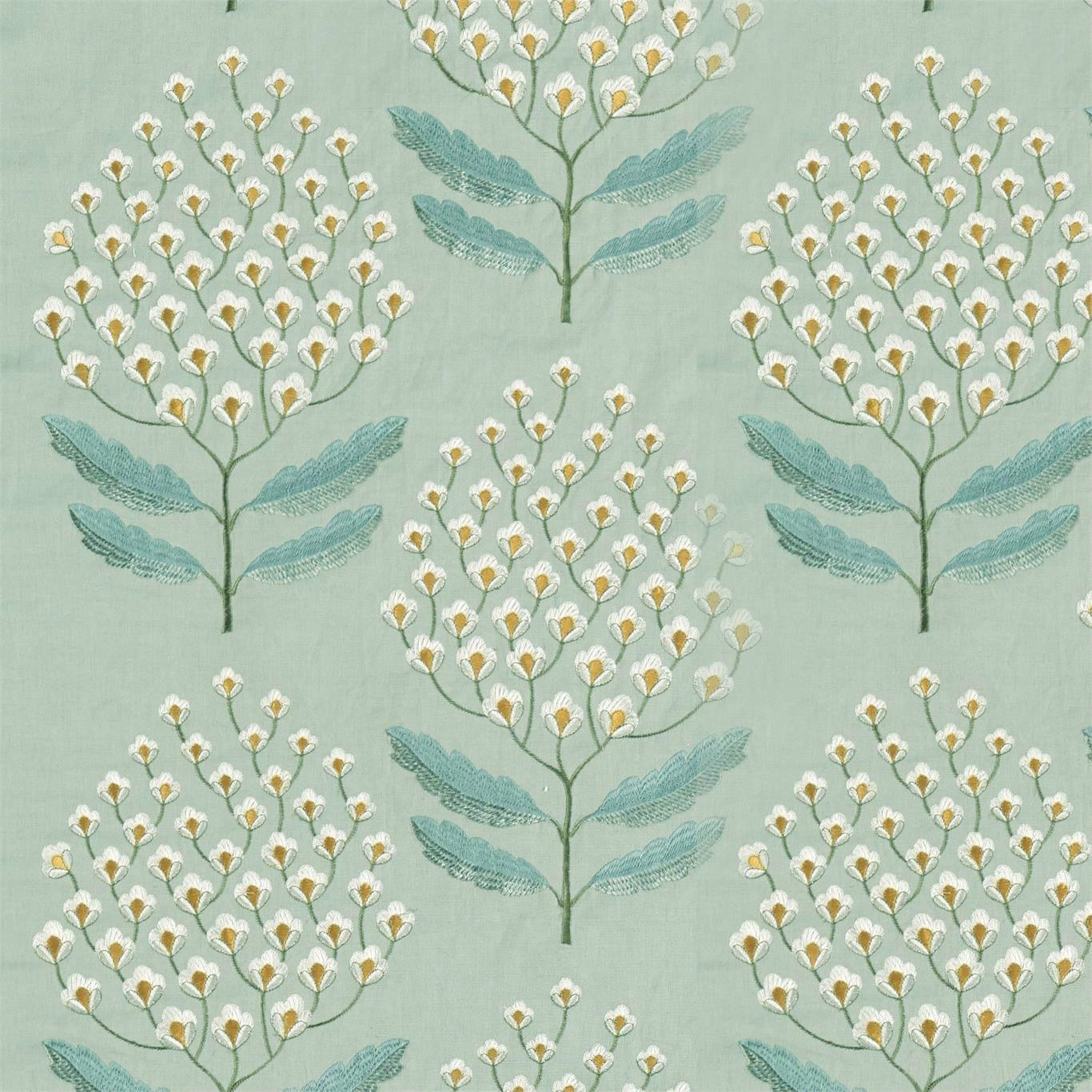 Soft blue-green fabric with repeated botanical tree motifs, white and gold blossoms, and teal leaves