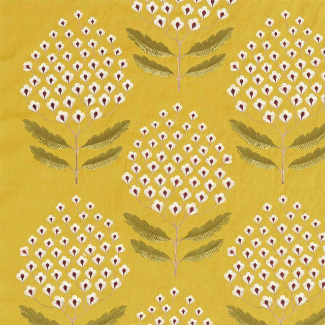 Yellow botanical fabric with white and red stylised flowers and olive leaves