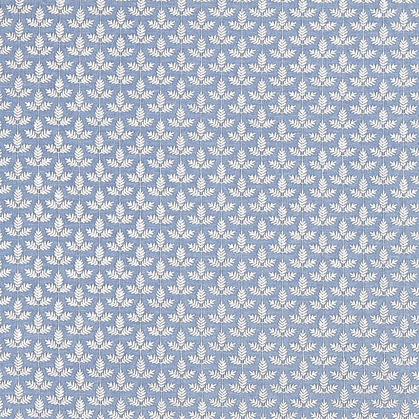 Blue woven fabric with small white botanical leaf motif