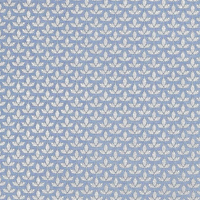 Blue woven fabric with small white botanical leaf motif