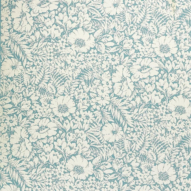 Cream floral fabric with aqua blue meadow motifs and dense leafy repeat