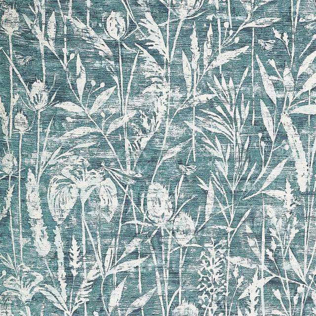 Botanical fabric swatch with ivory leaves and stems on a cool cobalt teal ground