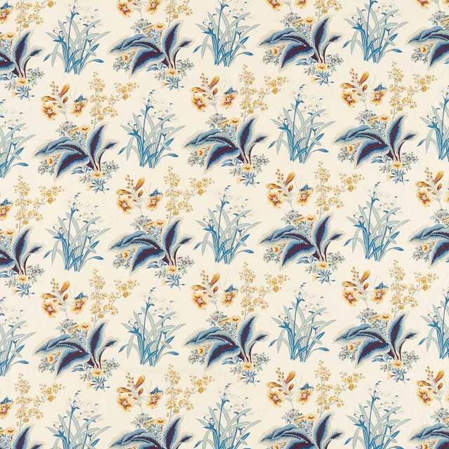 Cream botanical fabric with indigo leaves and primrose flower sprigs