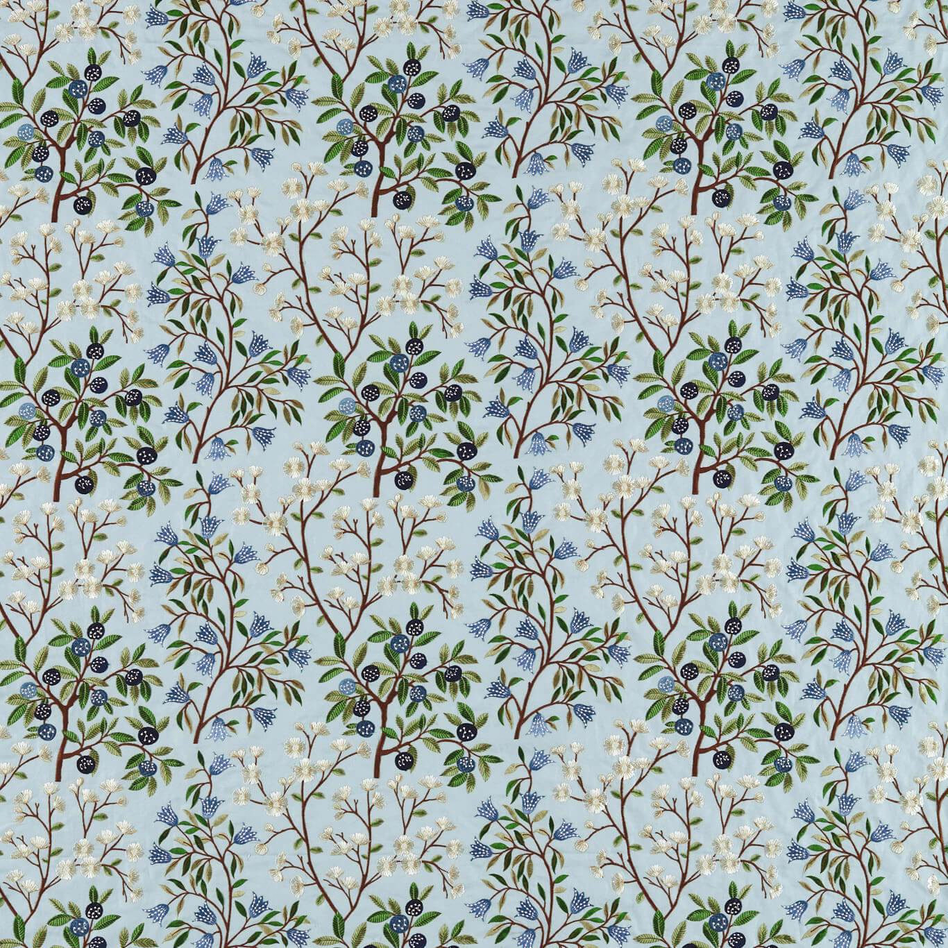 Pale blue botanical fabric with embroidered tree branches, leaves and berries