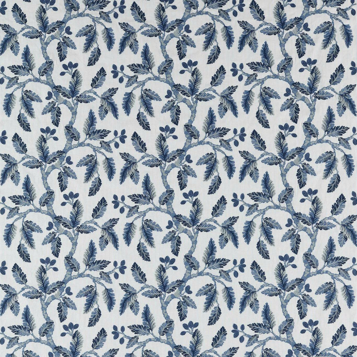 Indigo and pale blue botanical leaf pattern on a cream woven ground