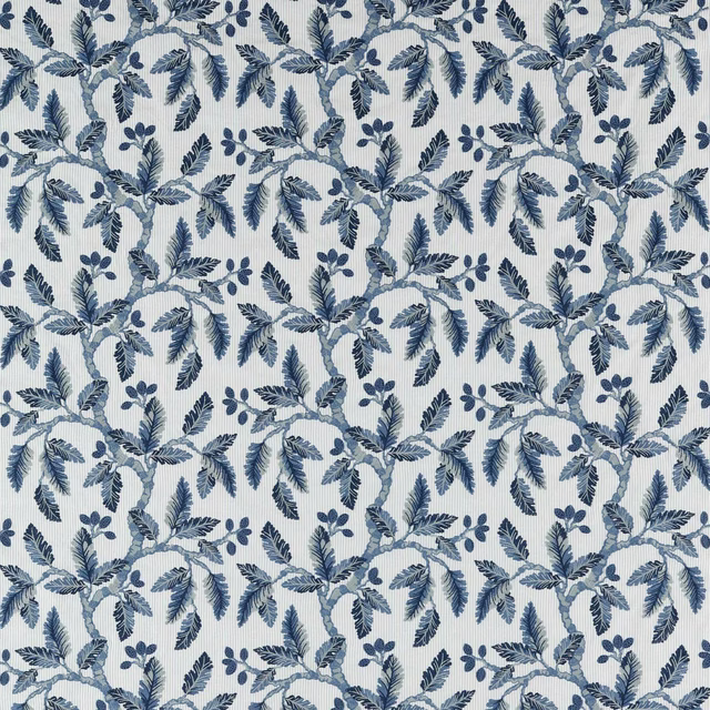 Indigo and pale blue botanical leaf pattern on a cream woven ground