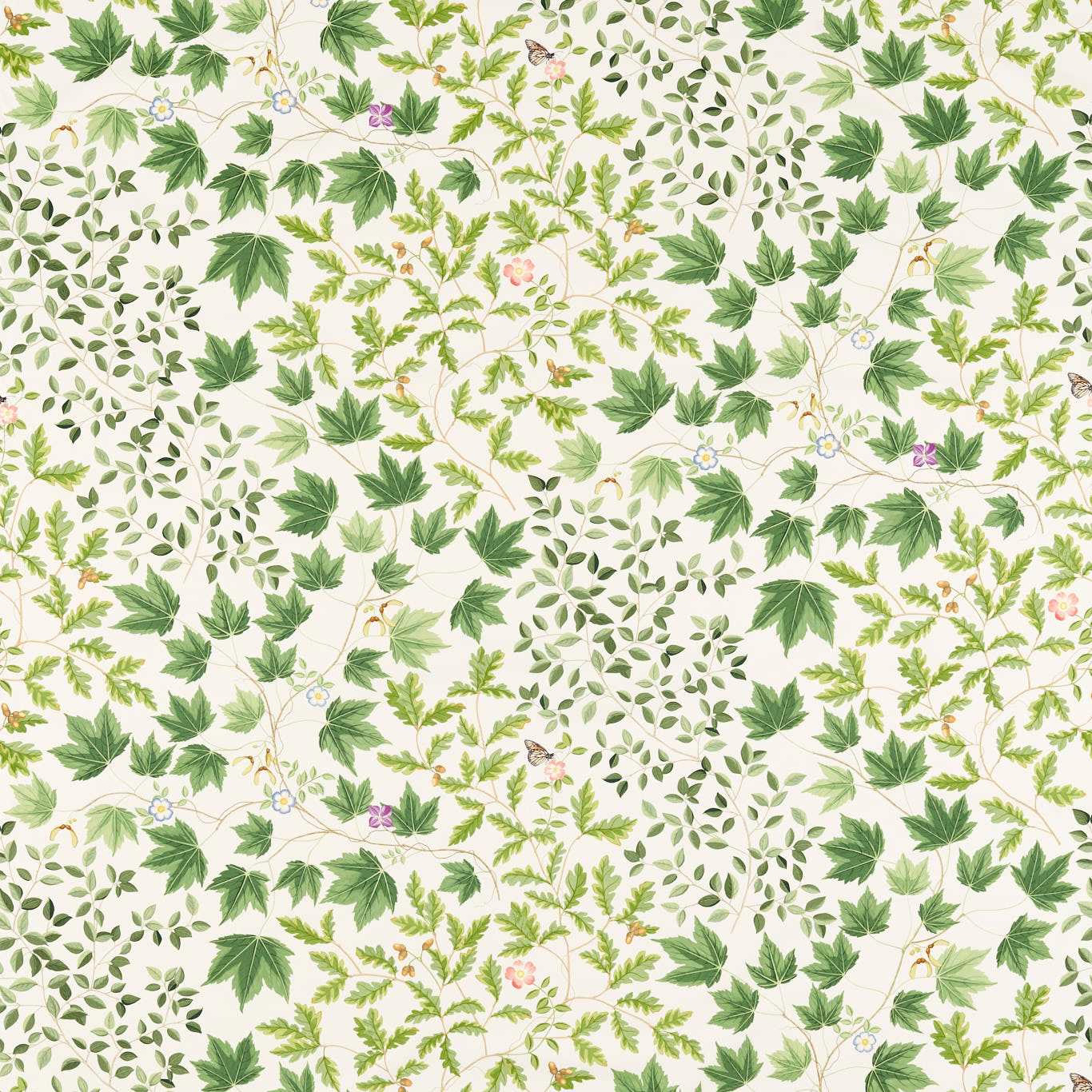 Leafy botanical print in layered greens on a cream ground