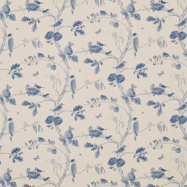 Indigo blue birds and branches printed on a linen ground with large repeat