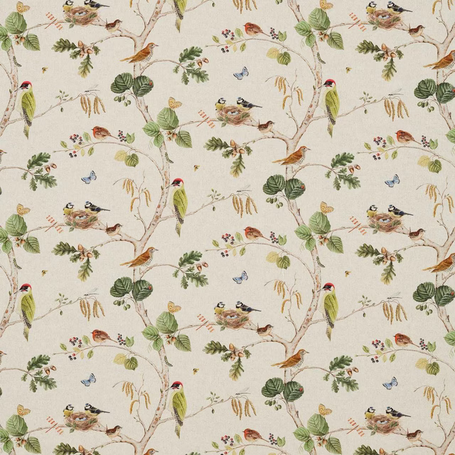 Cream woodland-print fabric with birds, branches and leafy foliage
