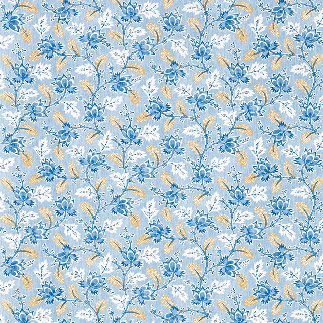 Indigo and pale blue floral wallpaper with cream and ochre botanical accents