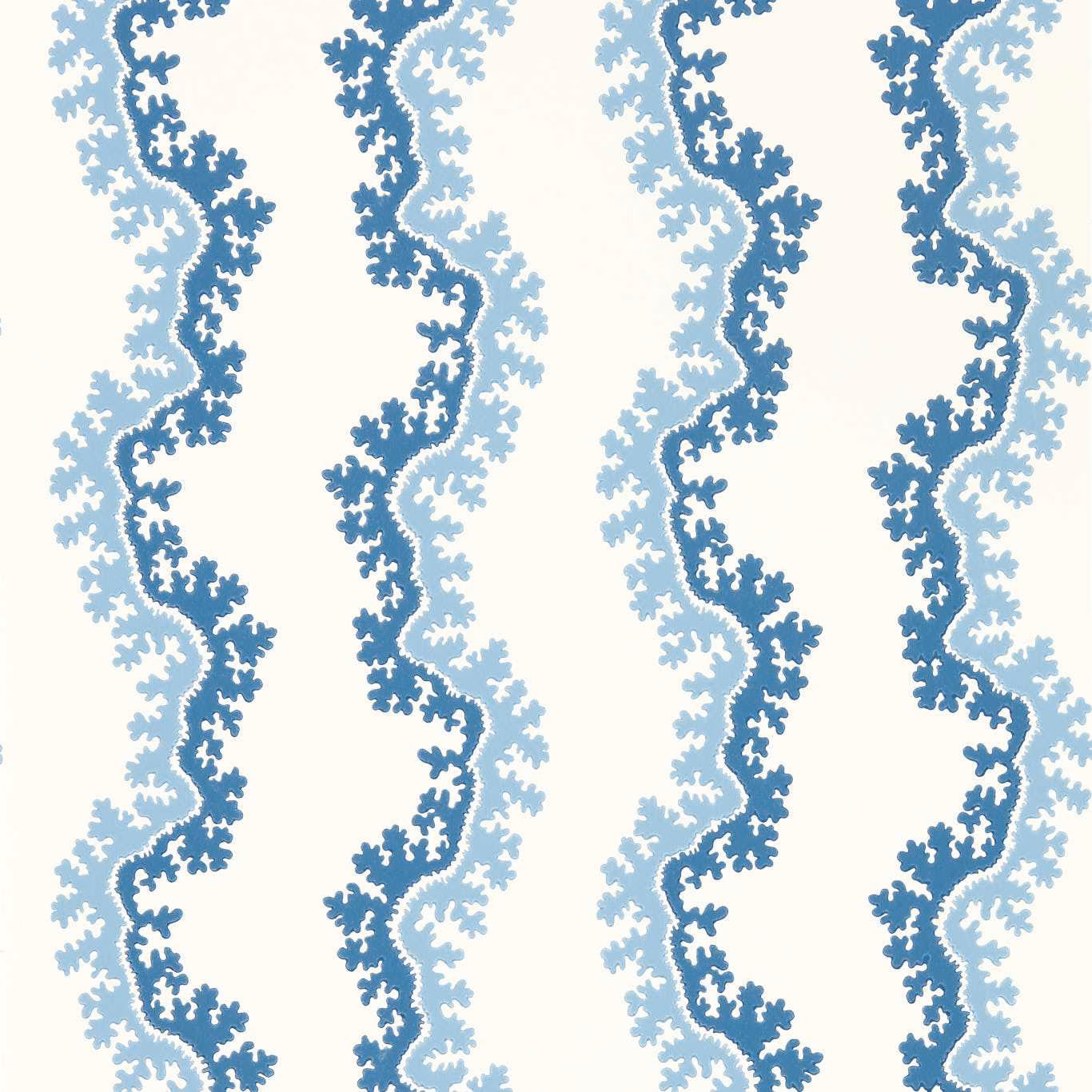 Cream wallpaper with indigo and pale blue sinuous branching vertical motifs