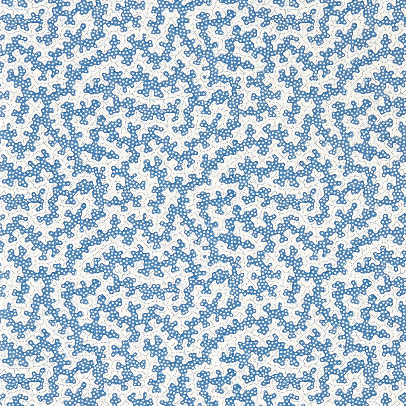 Dense stippled indigo-blue organic tracery on a warm ivory wallpaper ground