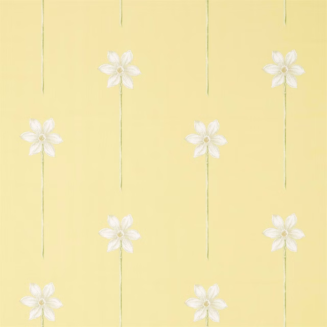 Pale daffodil-yellow floral fabric with white blossoms and slim green stems