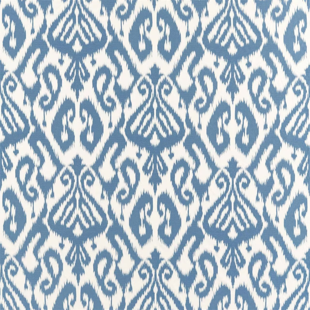 Indigo and cream ikat-style geometric fabric swatch with crisp woven pattern