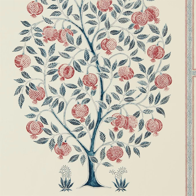 Cream wallpaper with dark blue pomegranate branches, red fruit and a narrow border.