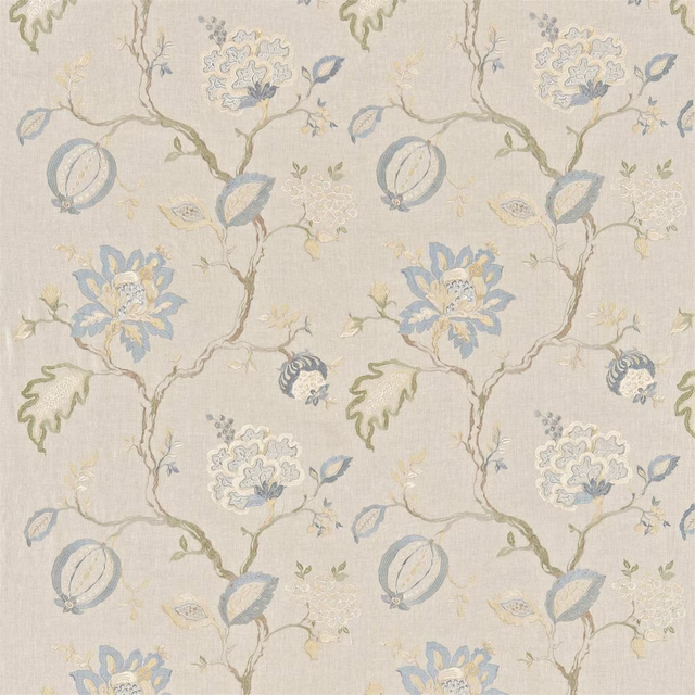Embroidered floral fabric with cornflower blue motifs on a linen ground