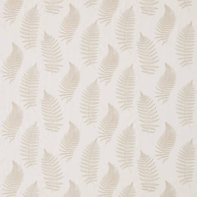 Ivory embroidered fern leaf fabric with pale tonal motifs on a cream ground