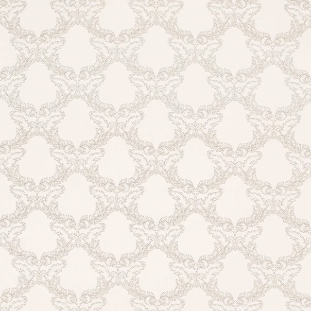 Pale stone cream damask trellis fabric on a warm cream ground
