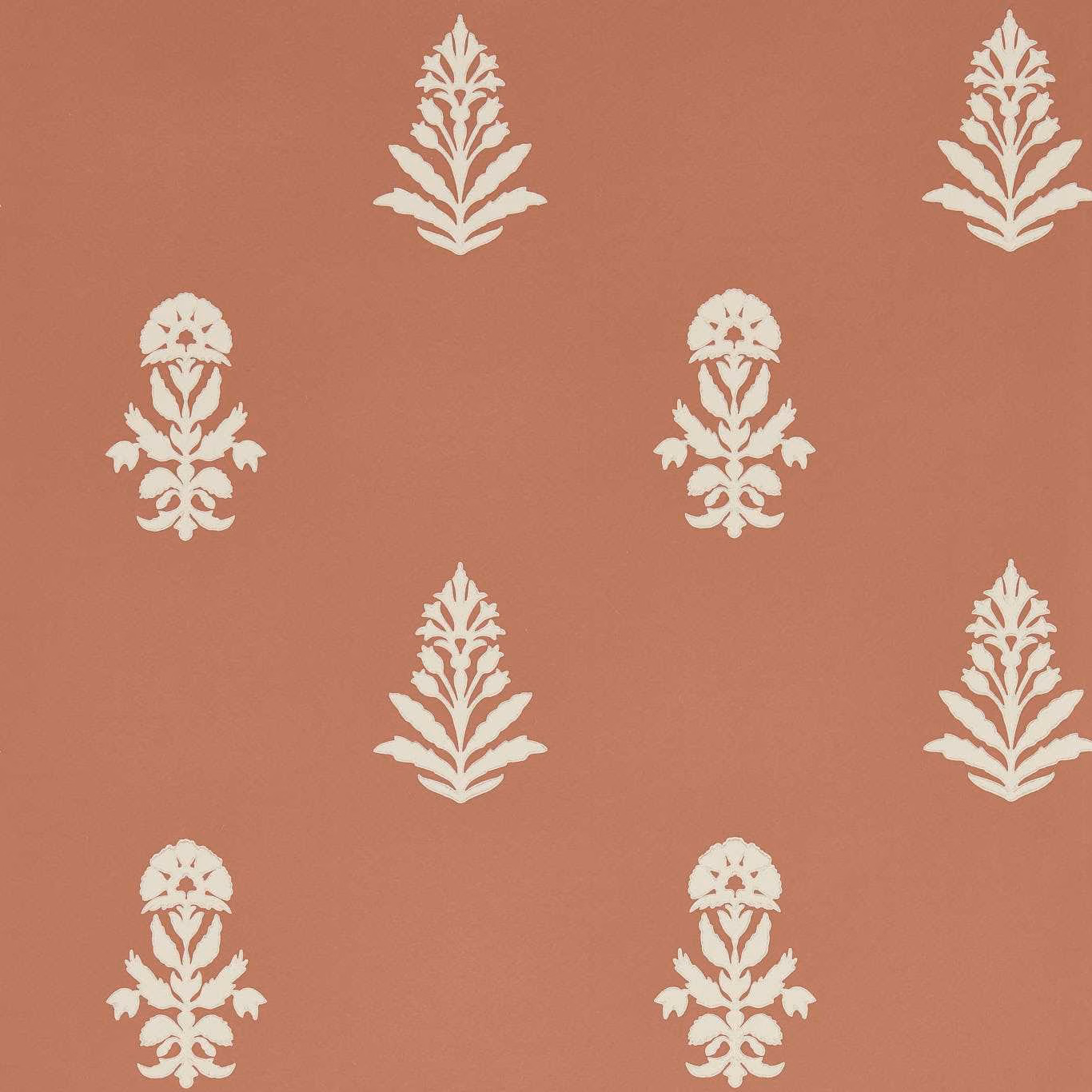 Dusty terracotta wallpaper with alternating ivory floral sprays and ornamental botanical motifs
