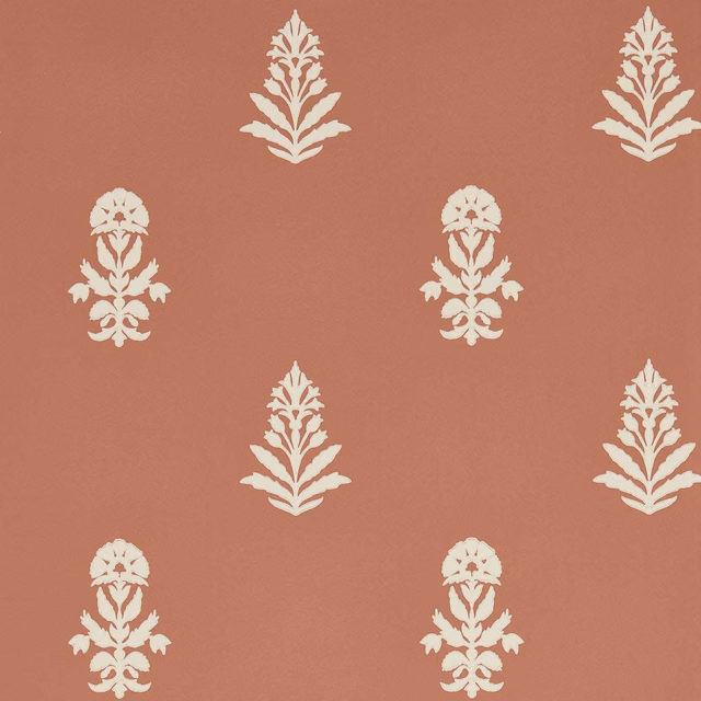 Dusty terracotta wallpaper with alternating ivory floral sprays and ornamental botanical motifs