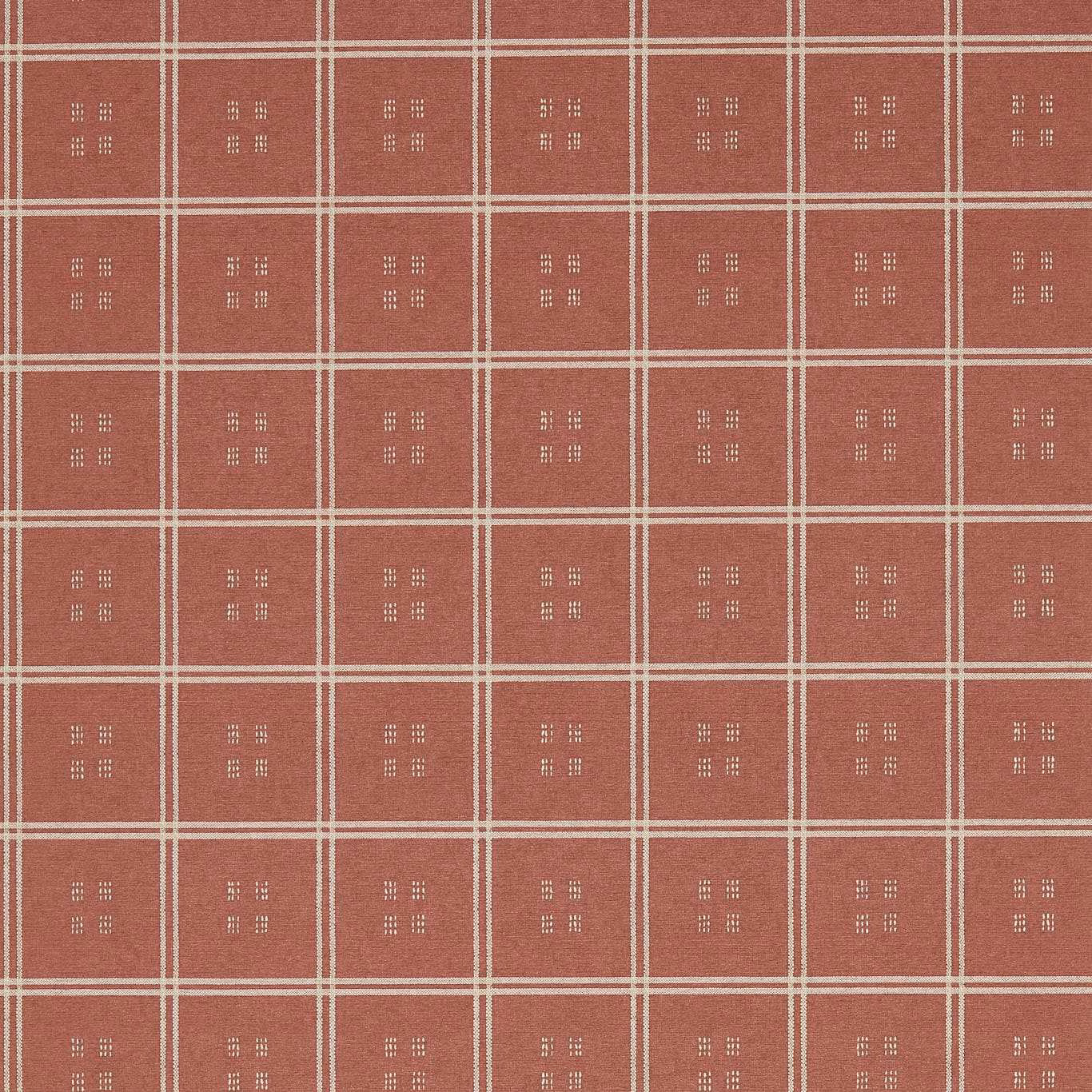 Dusty terracotta wallpaper with cream grid lines and small dotted square motifs
