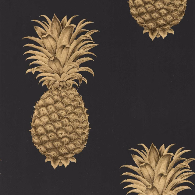 Large antique-gold pineapples and foliage on a deep graphite-black wallpaper ground