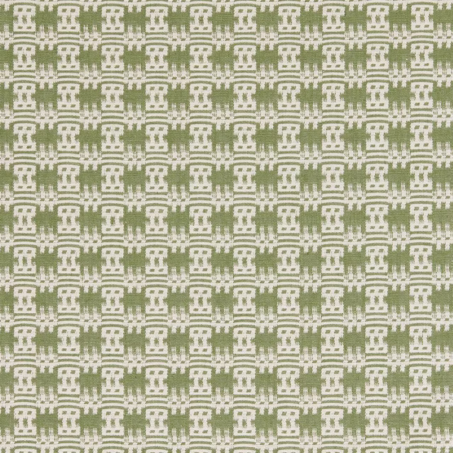 Close-up of a muted avocado green and ivory geometric woven fabric swatch