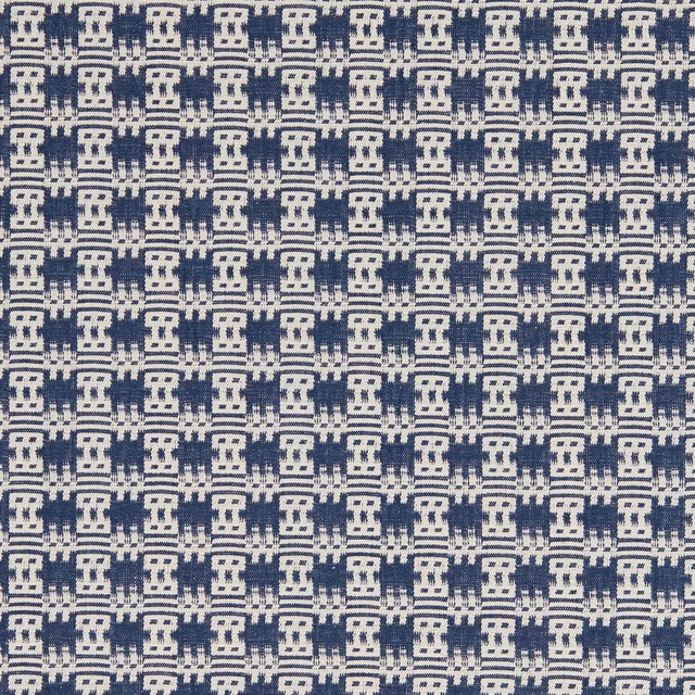 Indigo and cream geometric woven fabric with small repeating blocks