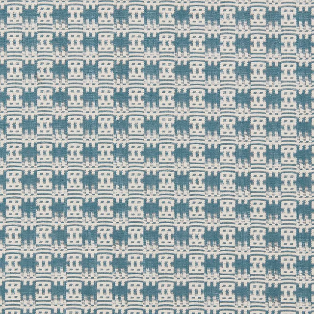 Small teal geometric woven fabric on a pale ground, tightly patterned in neat repeats
