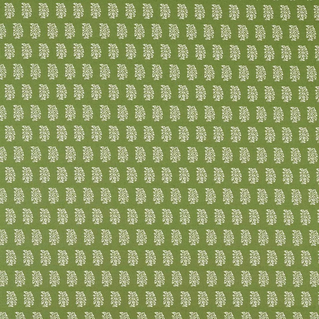 Avocado green woven fabric with small white botanical motif repeat