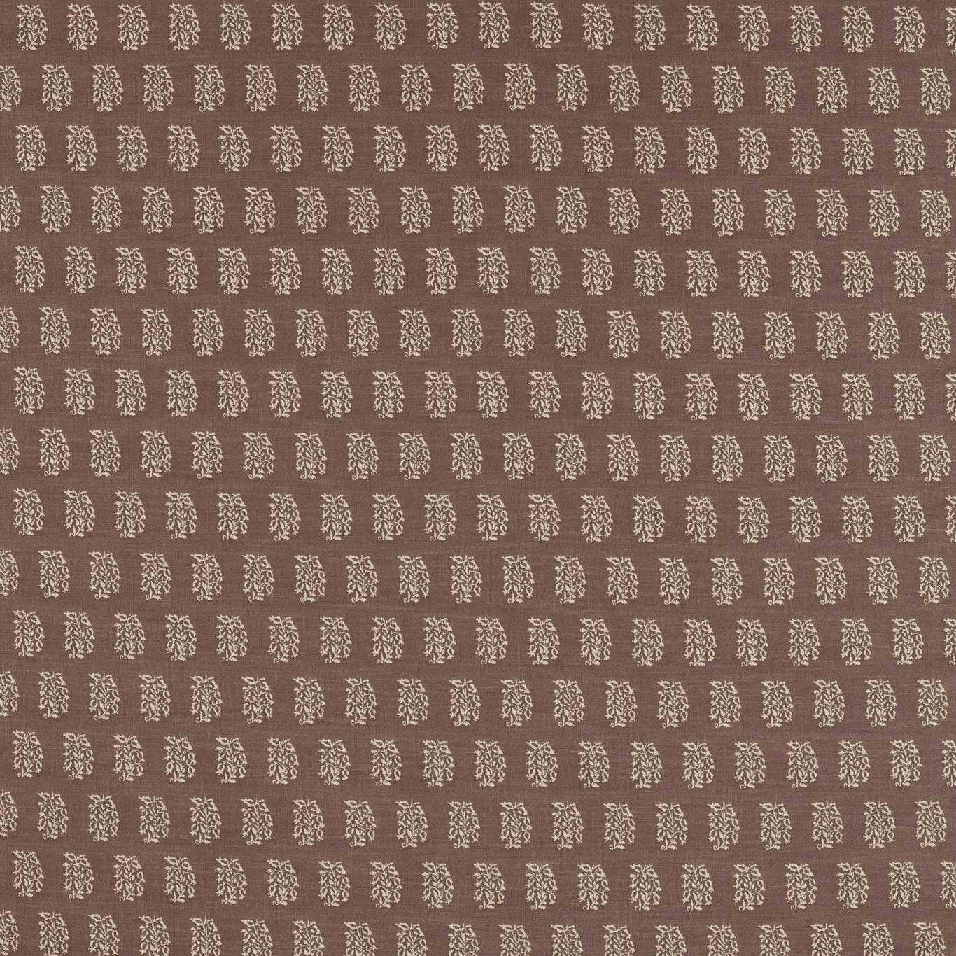 Close-up of cocoa brown woven fabric with small pale floral motifs in neat rows