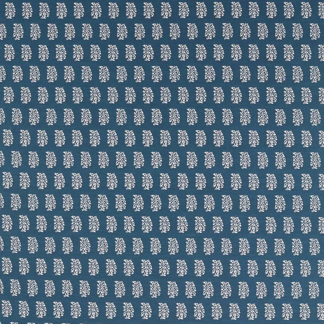 Blue fabric swatch with small ivory repeating motifs in neat horizontal rows