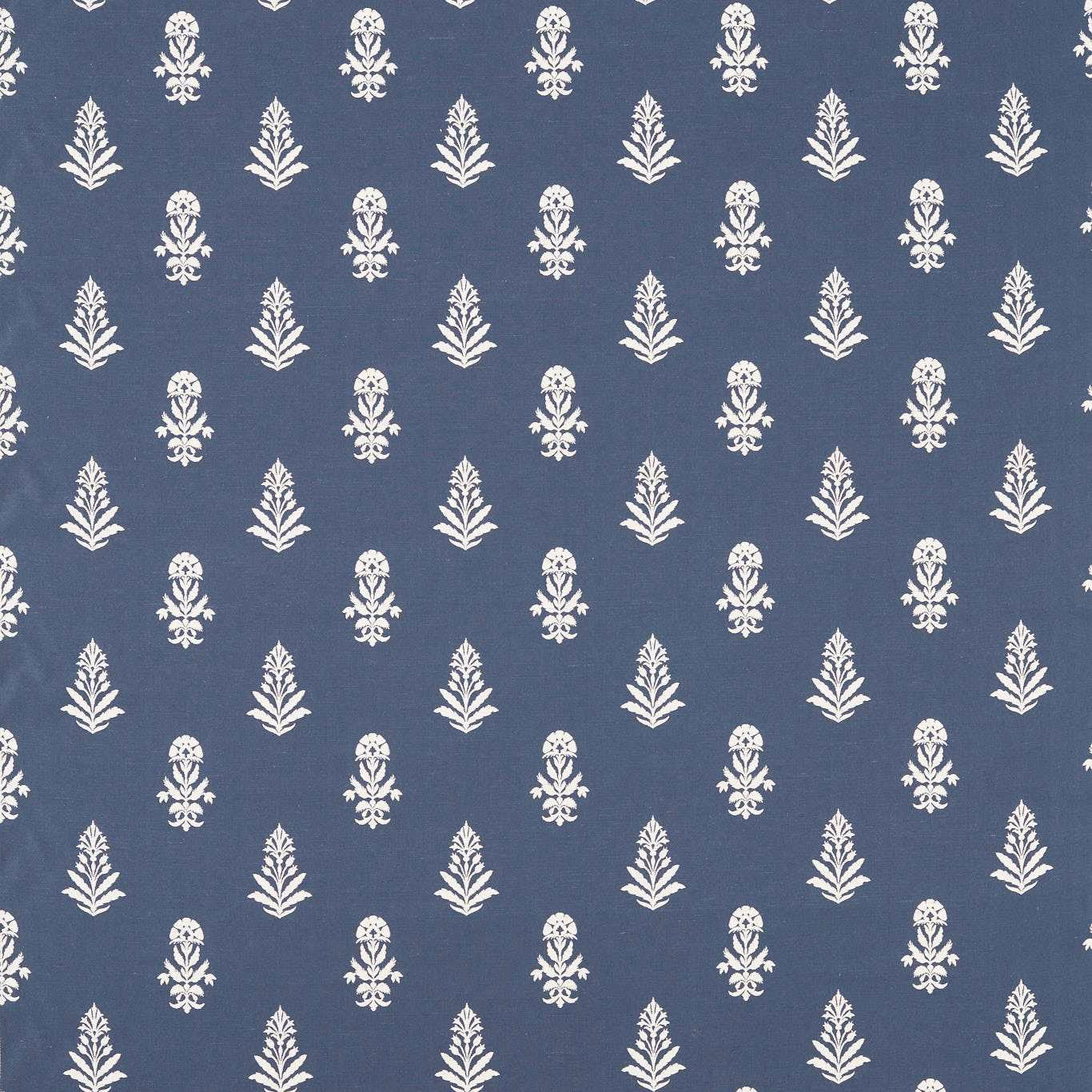 Blue woven fabric with small ivory damask-style motifs on a muted indigo ground