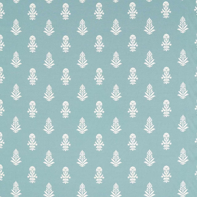Lagoon blue woven fabric with small ivory damask motifs on a smooth ground