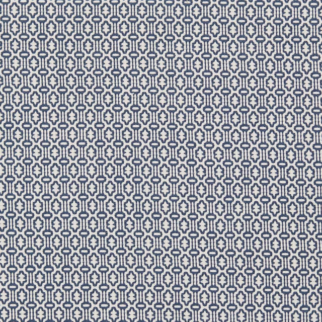 Close-up of small indigo geometric weave on a pale ground