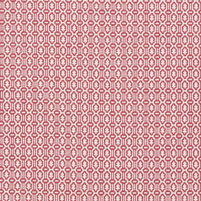 Pink-red geometric woven fabric swatch with small repeating motif