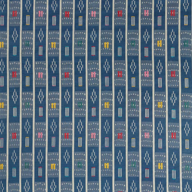 Blue woven fabric with narrow stripe columns and small multicoloured geometric motifs