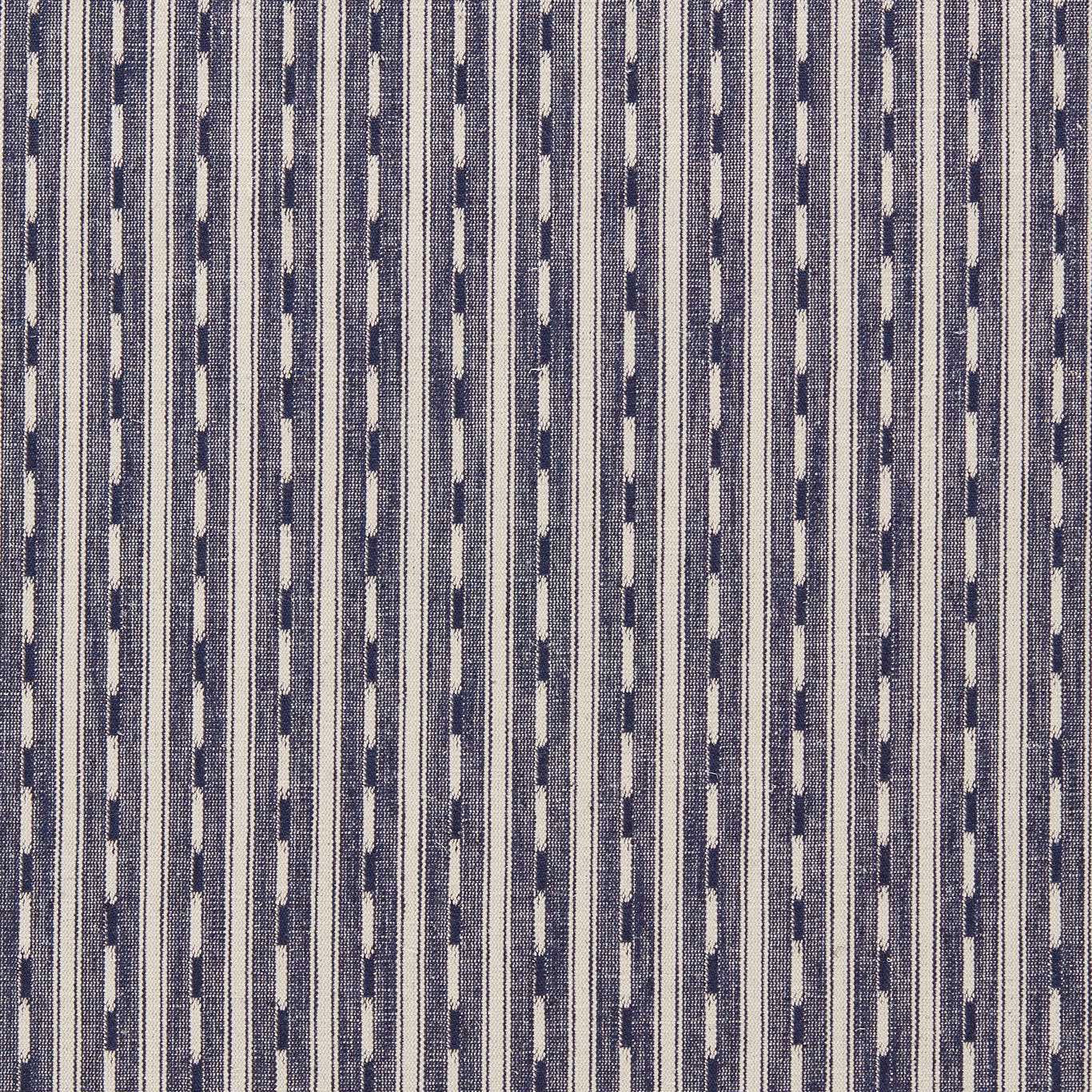 Close-up of a narrow indigo and pale striped woven fabric with fine texture