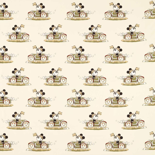 Cream printed fabric with Mickey driving cars in a neat repeating motif